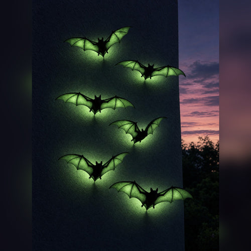 Belfry Flight bats mounted on an exterior wall at dusk, wings glowing acid green against the twilight sky