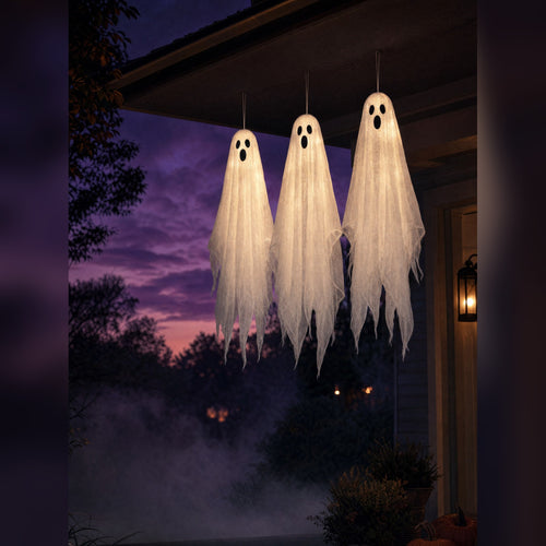 Three Drifting Souls ghosts hanging from a porch roof at dusk, glowing softly against a purple sky